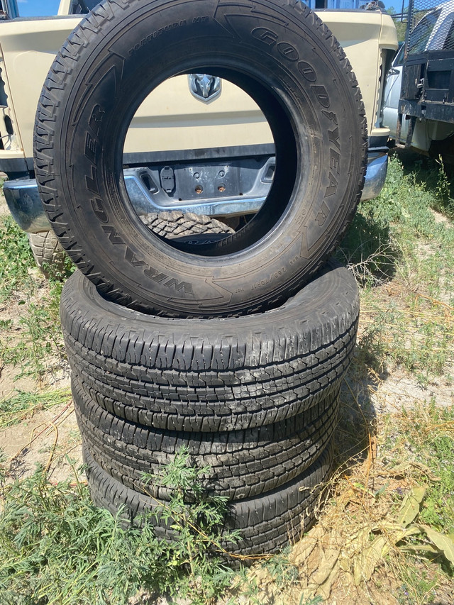 Four nearly new Goodyear Wrangler Fortitude HT 265/70R17 tires in Tires & Rims in Penticton