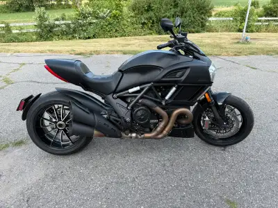 Stock Ducati Diavel. Purchased new in September of 2016. I am the original owner. All maintenance co...