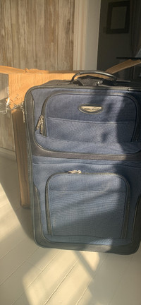 New 25” expandable suitcase