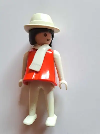 This is a charming, vintage Playmobil figurine from 1974, complete with a stylish hat and scarf. Bei...