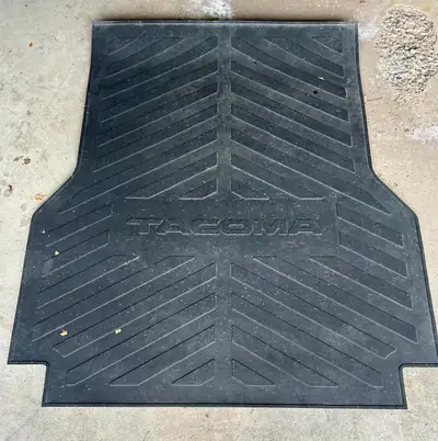 Authentic Toyota bed mat for Tacoma short box... Fits years 2005-2023