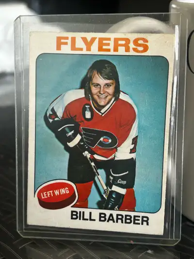 This is a vintage Bill Barber Philadelphia Flyers hockey card from 1974-75, a cool piece of NHL hist...