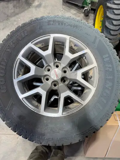 Set of four like new Goodyear Wrangler on factory GMC wheels. Fits GMC canyon 6x120 bolt pattern. Lo...