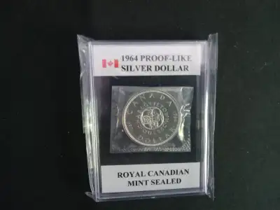 Sealed at the Mint back in 1964, and before they released them to the public. These coins still rema...