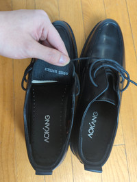 Aokang leather shoes