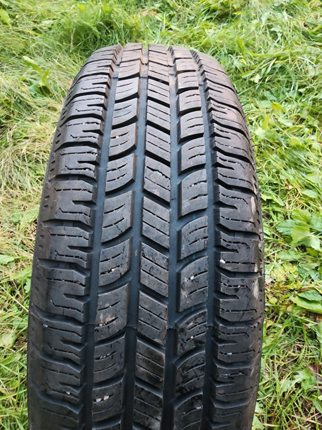 One tire like new 185 70 r14 in Tires & Rims in Fredericton