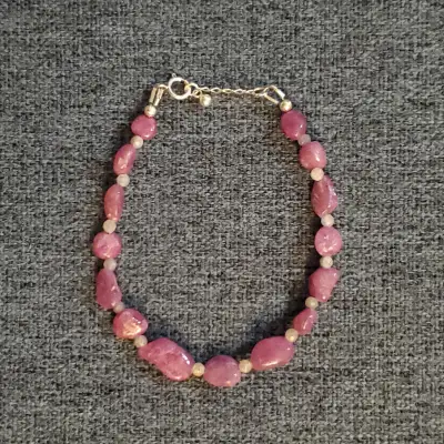 Red ruby with white sapphire in between, on sterling silver. 7-7.5 Inches long with extender Next da...