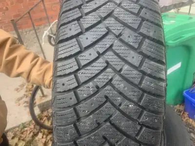 Offering a set of four Ironman Polar Trax winter tires, sized at 225/65R17 106T, perfect for your Ho...