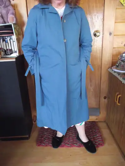 This is a London Fog "Weatherwear" long coat. Size 10 Petite Has a matching. buttoned on hood and lo...