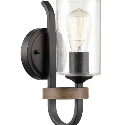Groggin Wall Sconce • Industrial Farmhouse Design: this wall sconce features on black metal finish a...