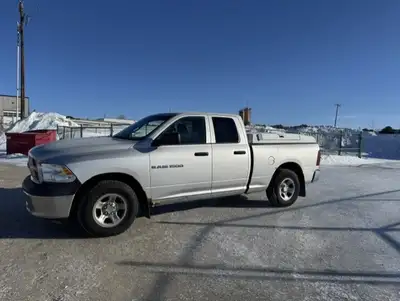 2012 Dodge 1500 some regular wear inside and outside. Comes with Bowie box bolted into truck bed can...