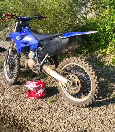 Selling 06 yz125. Starts first kick needs nothing plastics clean. New tires ,reeds, handlebar pad gr...