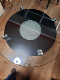4 ' round glass table, glass is 1/2" thick and beveled. 