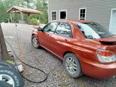 2007 Subaru Impreza 2.5i Sedan 5 speed manual transmission All wheel drive About 200,000km This car...