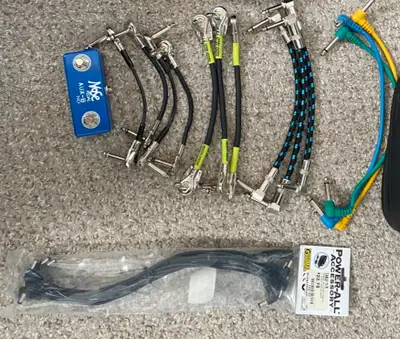 13 Patch cables, a daisy chain, and a Nose aux pedal.