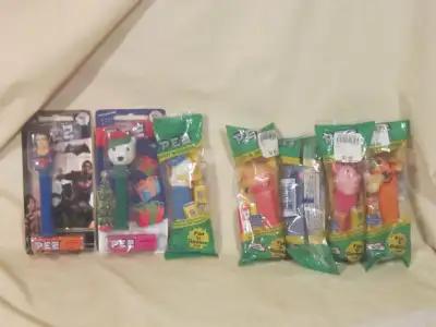 Lot of 7 ~ Pez Dispensers ~ New in Wrapper, View more