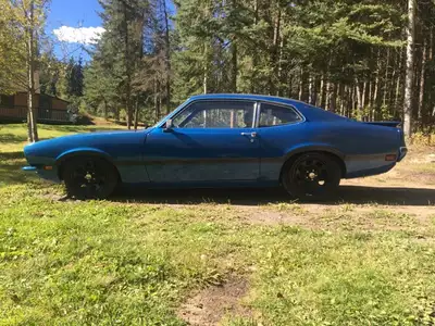 This recently completed one of a kind Restomod has 1970 Ford Acapulco Blue paint with black Grabber...