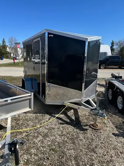 SALE PRICE $10200 now $9200 brand new 2024 6x10 Aluminum enclosed trailer , rear ramp door side man...