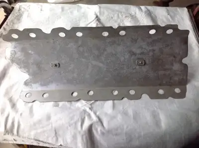 Small block Mopar lifter valley windage tray. These seldom come available.