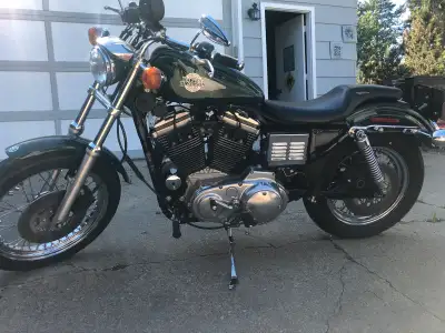 1996 Harley Davidson Sportster, 1200 cc, drag bars straight pipes low milage. Sissy bar, riding gear...