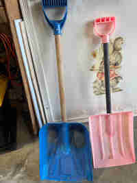 pink and blue shovels