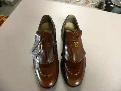 All leather men's golf shoes. Never been worn. Size 10 1/2. Currently have metal spikes but can be c...