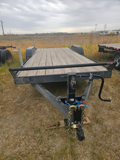 2025 20 foot low bed hauler, tandem 7000 lb axels, two foot beaver tail, two heavy-duty 2 ft. x 5 ft...