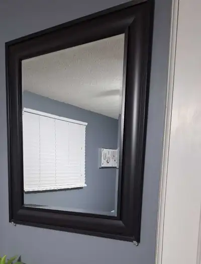 Black framed wall mirror, View more