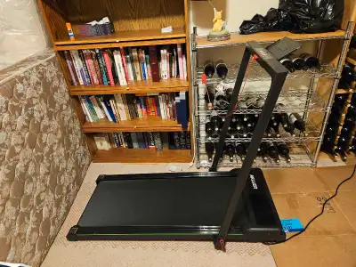 Walking pad, barely used. About 1 & 1/2 years old in great shape.