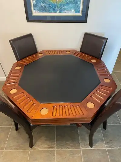 This solid wood poker table with chairs is perfect for game nights! It features a black leather play...