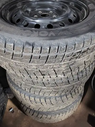 For sale, is this set of Yokohama IceGUARD iG51V Snow Tires in size 225/65R17 that are mounted on bl...