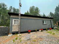 Tiny Home on 80 acres partially vacant with guaranteed income