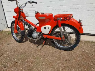 This is the early CT90 pushrod engine bike. Lots of original bruises and scratches. Always stored in...
