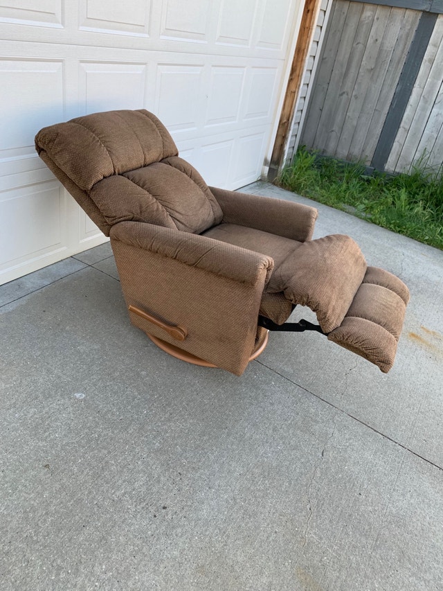 Free delivery. Swivel rocker recliner lazboy Chairs & Recliners