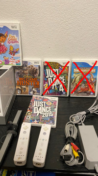 Nintendo Wii plus games and extra remotes