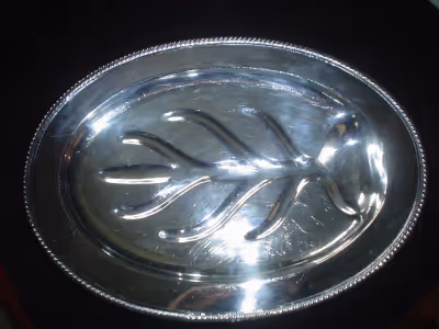 Large platter, with juice grooves. In good condition. Four feet lift it off surface. Silverplate on...