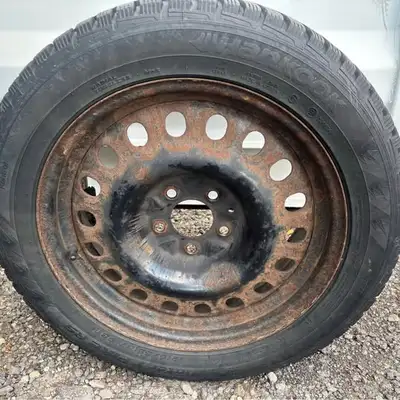 Selling 4 Hankook Winter i*Pike radial tires, size 215/65R17. With 4 rims. Good for winter driving!...