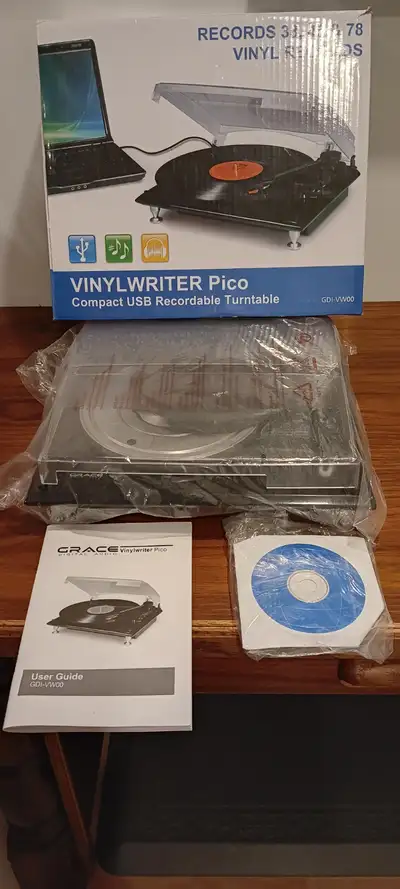 COMPACT NEW TURNTABLE USB TO COMPUTER RECORD'S 45, 33, 78 VINYL RECORDS. MANUAL, CORD. NEVER USED. $...