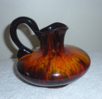 Decorative orange pitcher