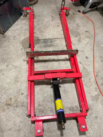 Selling like new sled jack..... Quick, even lifting with a 1,000 lb. lift capacity 28" lift height R...
