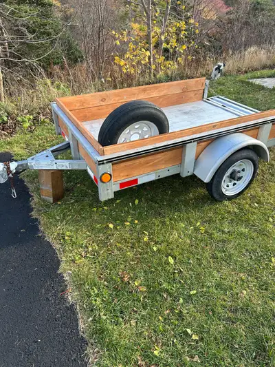 4x6 galvanized trailer in excellent condition and needs nothing licenced for a yr located in topsail...