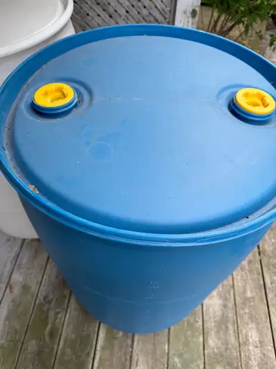 55 gallons closed top barrel drum plastic $20 each Food grade, blue and white available Can be used...