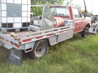 parting out a few truck's 1990 ford f350 diesel. Has a good reusable deck, a good 5 speed tranny, en...