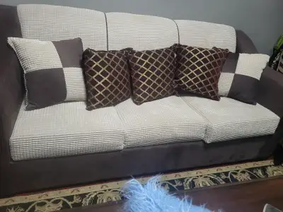 3 seater couch with pull out bed. Hardly used.