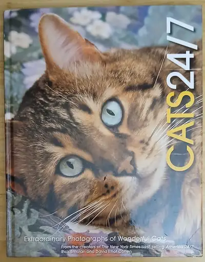 Cats 24/7 each collects more than 500 intimate, funny, and charming photographs taken by professiona...