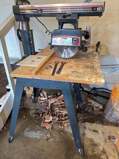 Compound miter radial saw with stand and accessories, View more