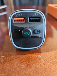 Bluetooth wireless FM transmitter with charger.