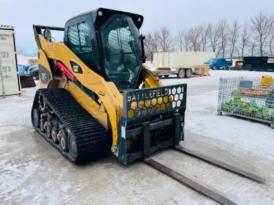Great Machine. Has been used for snow clearing and pallet loading for past 4 years. All track wheels...