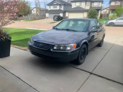 Selling my family commuter, good brakes, battery, summer and winter tires and rims, starts and runs...
