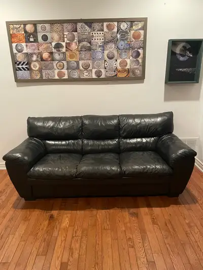 FREE DELIVERY. Black Leather Sofa, View more